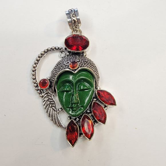 Sterling Silver Pendant with Green Carved Face and Red Garnet Accents - Picture 2 of 10